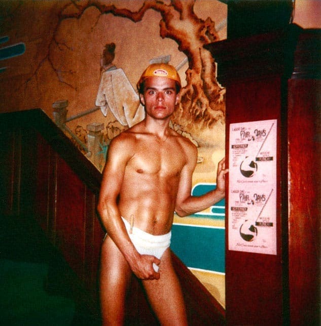 Donated to Tom of Finland Foundation: "Gold Cap". A strategically placed clothespin advertises a preference by this sensitive young man. Restored 1978 Polaroid photograph taken by Frank Melleno, 14.25” x 11”.